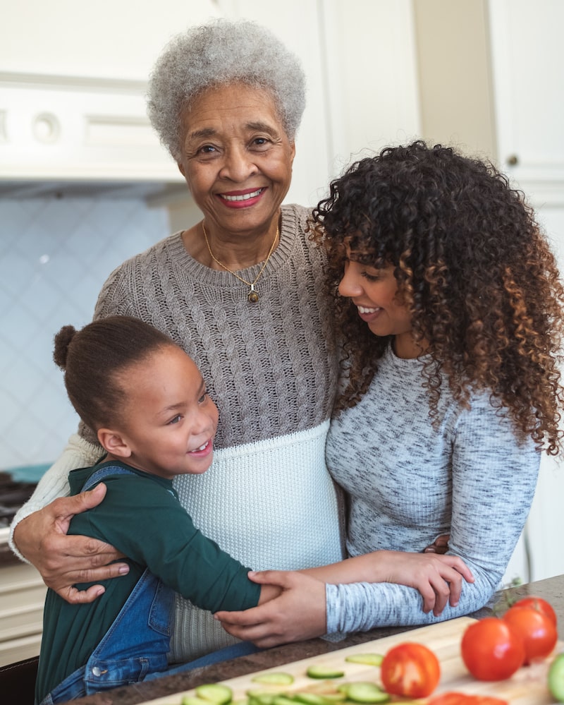 Smiling woman with grandchildren