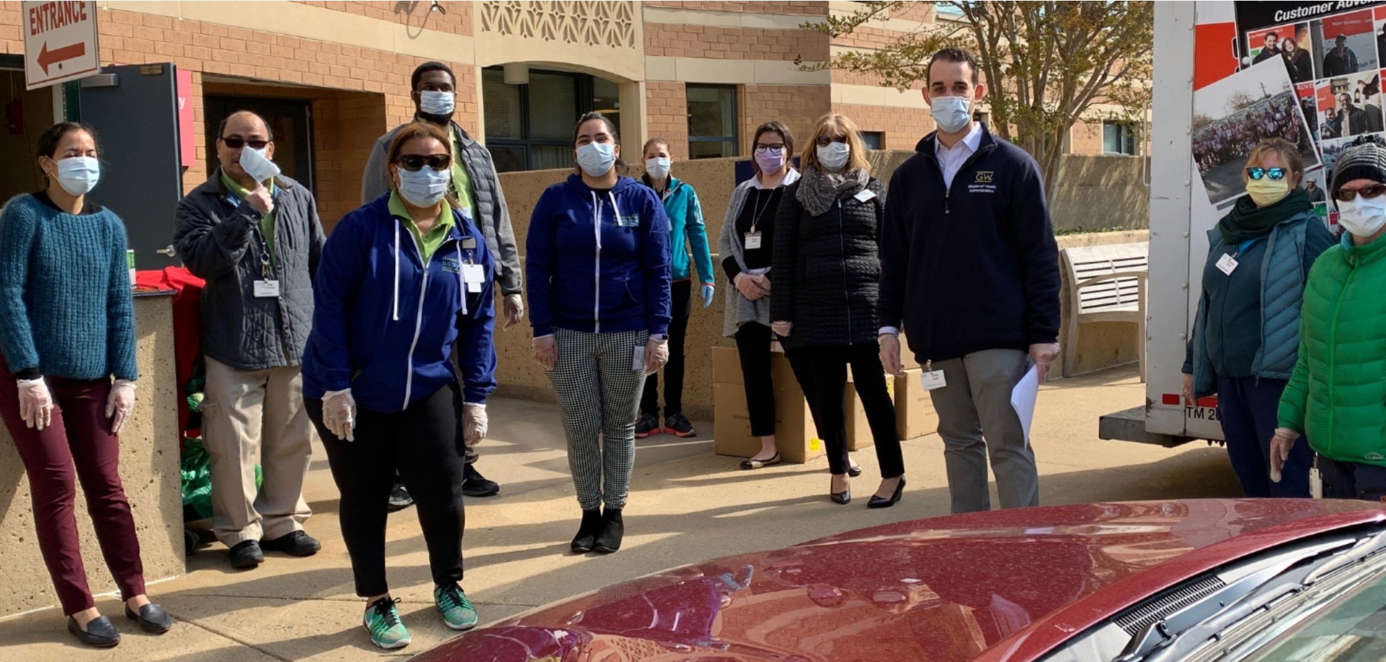 Goodwin Living staff team up to distribute the surgical masks