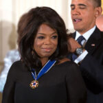 Oprah Winfrey wearing medal with President Barack Obama