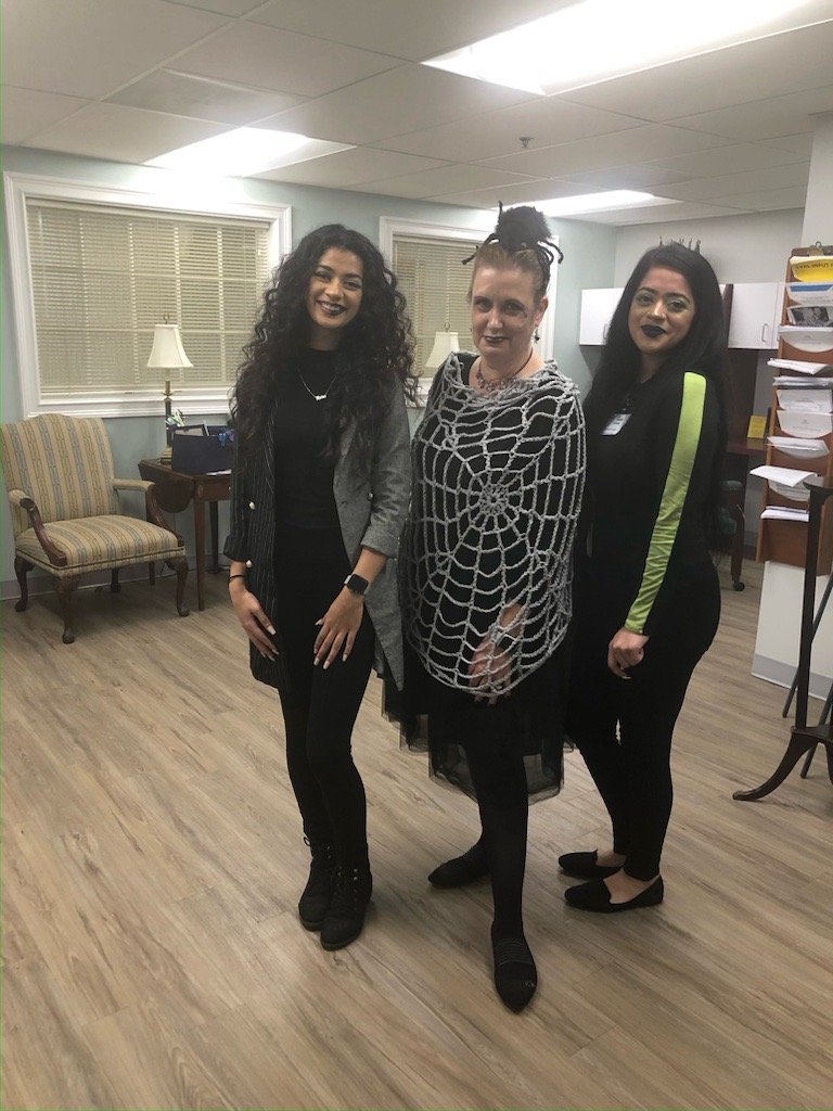 HR Director Heba Sikander [left], HR Benefits Manager [middle] and Reema Sikander dress for the spooky season