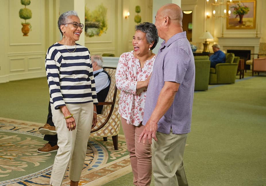 A group of older adults in the Goodwin House Bailey's Crossroads lobby.