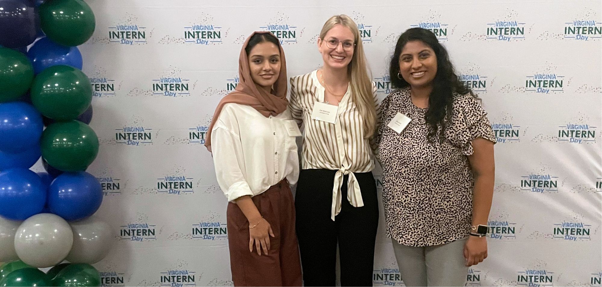 top employer for interns. Goodwin Living People Engagement Manager Zoe Marcuse stands with two interns at the Virginia Intern Day celebration.