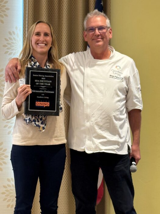 Alexandra (Alex) Freiman, Registered Dietitian at Goodwin House Alexandria, accepts the 2025 Dietitian of the Year Award from the Senior Dining Association.