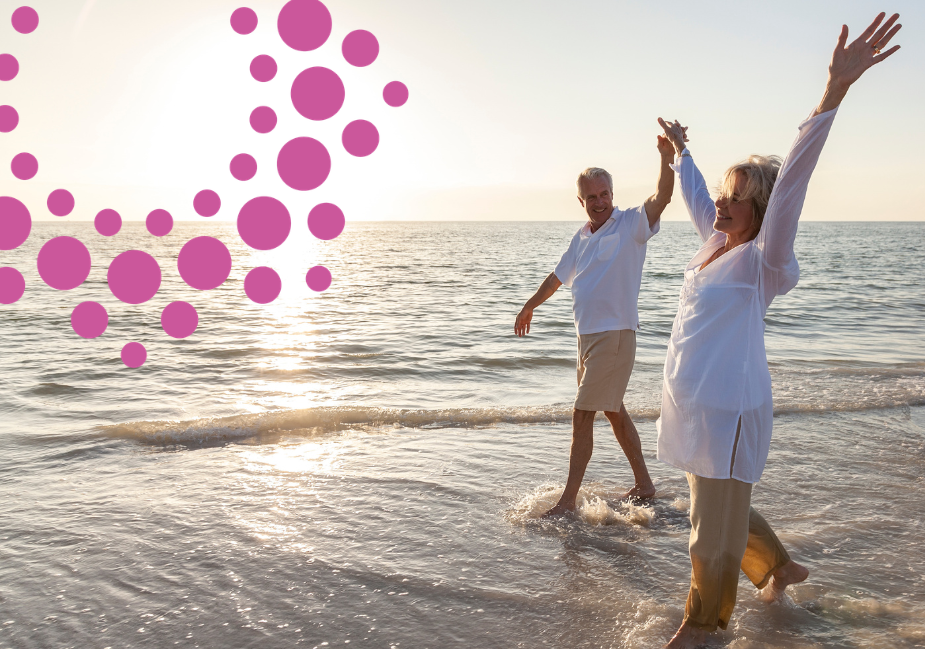 make aging at home a breeze. a senior couple walk along a beach.